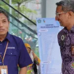 Kepala BPJS Kesehatan Cabang Sidoarjo, Munaqib(kiri).