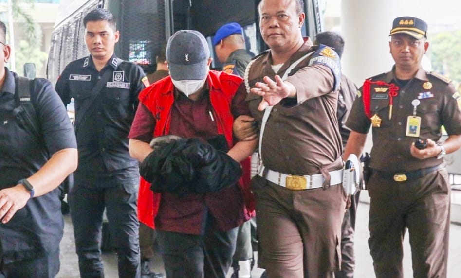 Terdakwa Hakim saat digelandang jaksa
