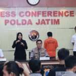 tersangka dalam kasus dugaan penyalahgunaan data pribadi berupa Kartu Tanda Penduduk (KTP) dan Nomor Pokok Wajib Pajak (NPWP) milik orang lain.
