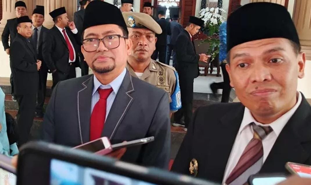 Kepala Dinas PMD Kabupaten Probolinggo Fathur Rozi (kiri) dan Pj Bupati Bondowoso M. Hadi Wawan (kanan).